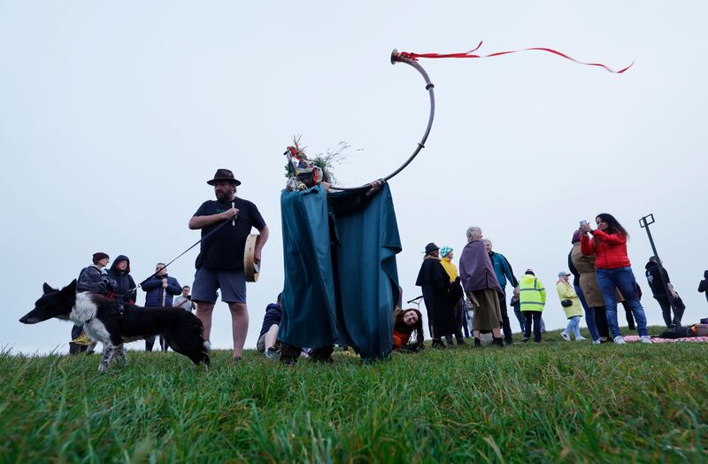 The Loughnashade trumpet player with other visitors to the Hill of Tara on Wednesday morning. Photograph: Alan Betson/The Irish Times

