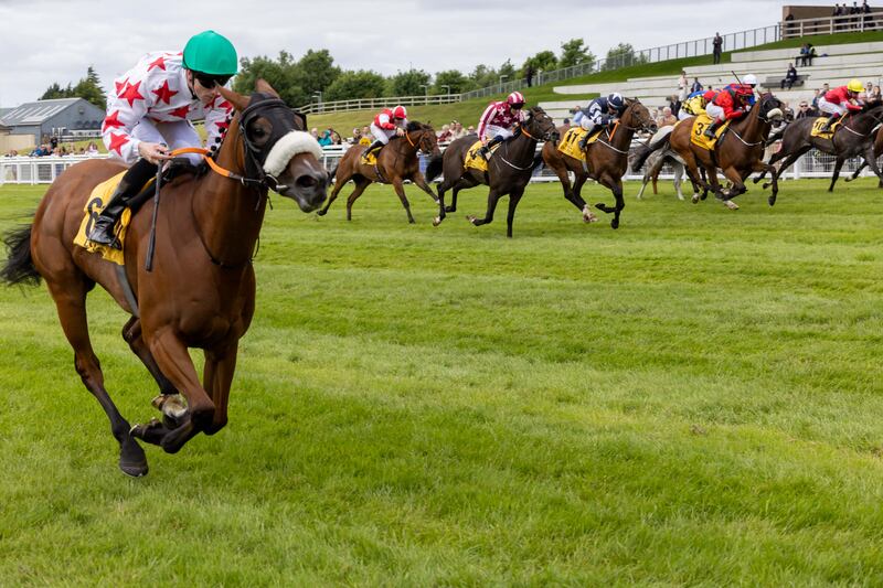 Billy Lee on Amazon Lady wins The Dubai Duty Free Rockingham Handicap at the Curragh. Photograph: Morgan Treacy/Inpho 