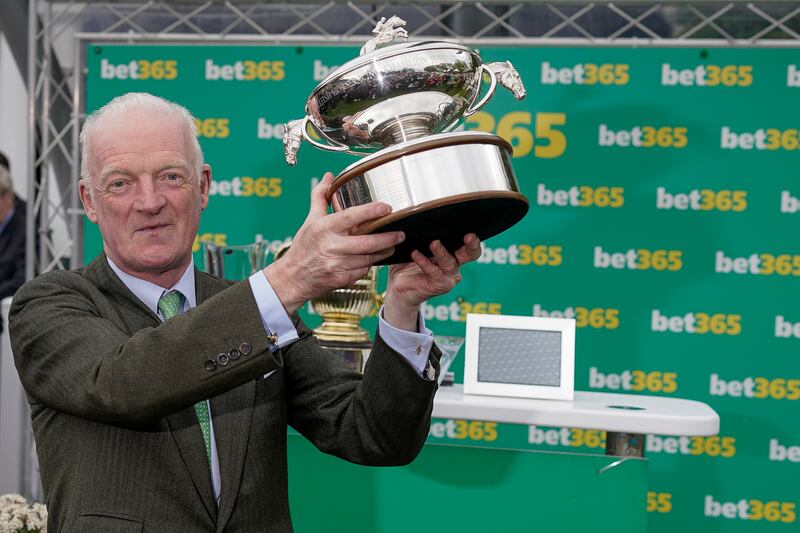 Willie Mullins with his champion trainer trophy at Sandown. Photograph: Alan Crowhurst/Getty Images