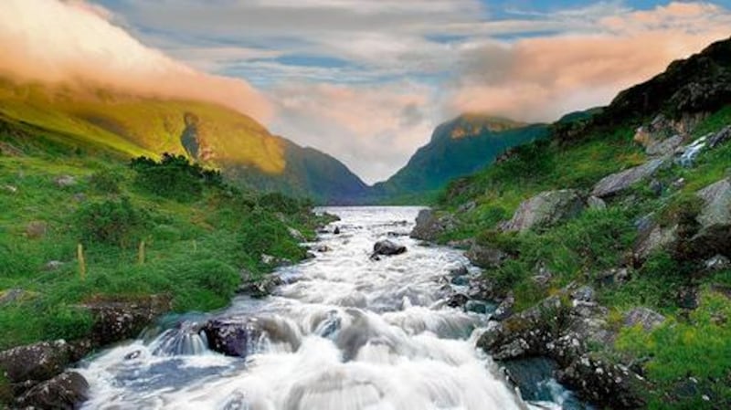 Stunning sights, clockwise from left: climbing Great Skellig; Clonmacnoise; sunlight on the backstone of Cairn T; and the Mourne Wall. Photographs: IIC/Axiom/Getty, Brian Morrison/NITB WILD WONDER The Gap of Dunloe. Photograph: Slow/PC/Getty Images