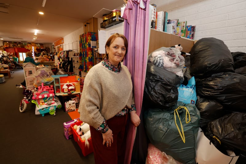 Martina Cooper at the Jack & Jill Foundation shop in Portlaoise with the large quantities of items donated for sale. 'It's cool now to buy second-hand'. Photograph: Alan Betson 