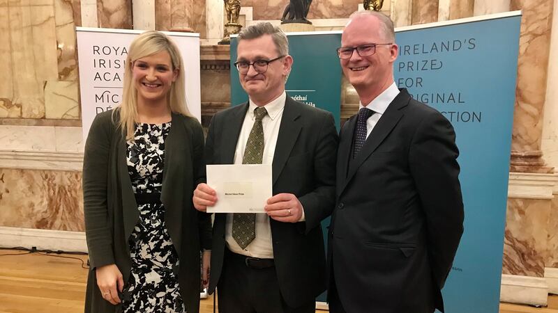 Breandán Mac Suibhne, winner of the inaugural Michel Déon Prize, with minister Helen McEntee and Michael Kennedy, president of the Royal Irish Academy