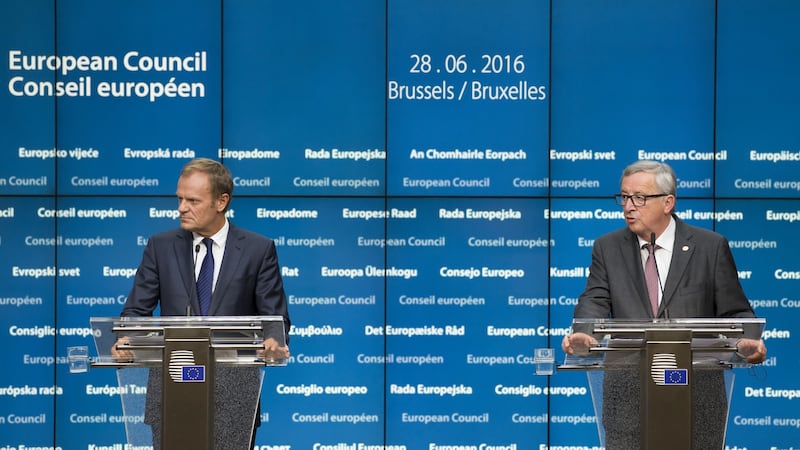 Jean-Claude Juncker, president of the European Commission, right, speaks during a news conference with Donald Tusk, president of the European Union, after a meeting of EU leaders in Brussels, Belgium. Photograph: Jasper Juinen/Bloomberg