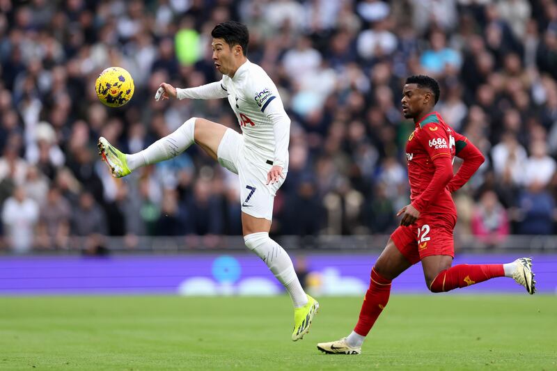 Son Heung-Min of Tottenham Hotspur controls the ball from Nelson Semedo of Wolverhampton Wanderers. Photograph: Alex Pantling/Getty