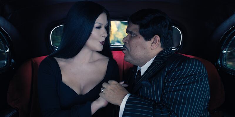 Wednesday: Catherine Zeta-Jones (with Luis Guzmán as Gomez) dominates the screen as Morticia Addams. Photograph: Netflix