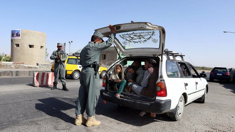 Afghan police search a car at a highway on the outskirts of Herat, Afghanistan, after an attack on foreign tourists,  August 4th, 2016. Photograph: Jalil Rezayee/EPA