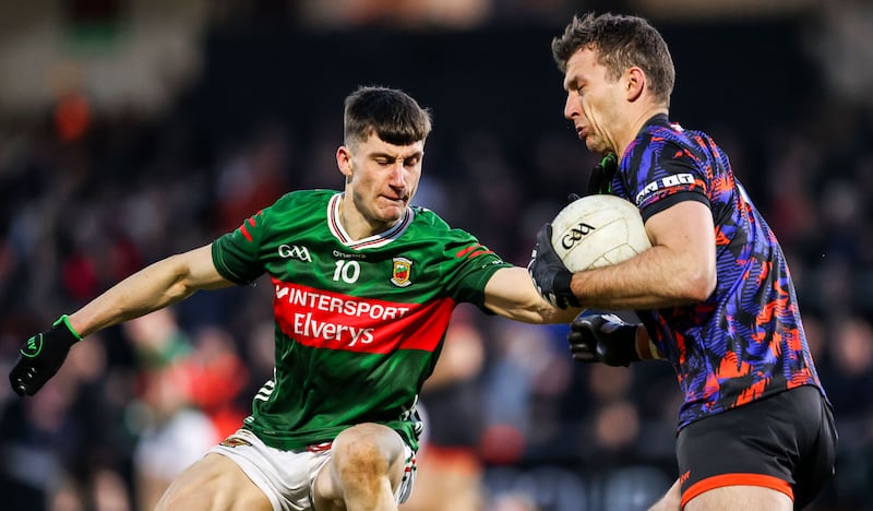 Mayo's Davitt Neary and Armagh's Ethan Rafferty during the NFL Division 1 game at the Athletic Grounds on Saturday. Photograph: Nick Elliott/Inpho