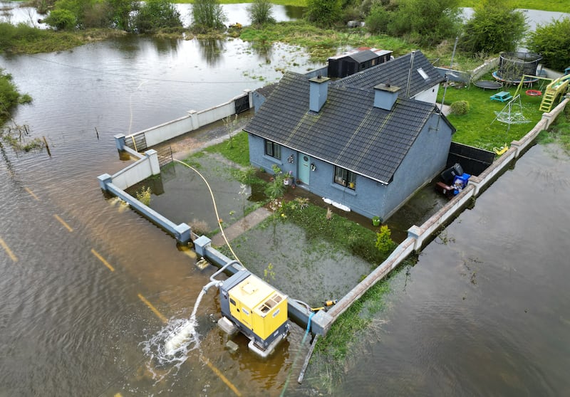 The family home of the McLoughlin family at near the village of Curraghboy, Carrick, Co Roscommon which is surrounded by water from a currently rising  overflow of Lough Funshinagh. Photograph: Alan Betson / The Irish Times

