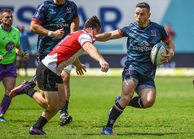 Ulster's John Cooney makes a break against the Lions. Photograph: Deon van der Merwe/Inpho