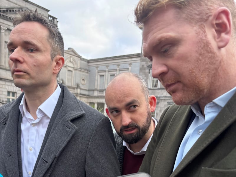 Eoin Hayes (centre) negotiates a tricky morning on the Dáil plinth with now former Social Democrats colleagues Cian O'Callaghan and Gary Gannon. Photograph: Cate McCurry/PA.