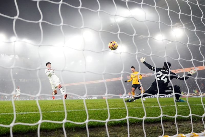 Wolverhampton Wanderers' Hwang Hee-Chan scores. Photograph: David Davies/PA