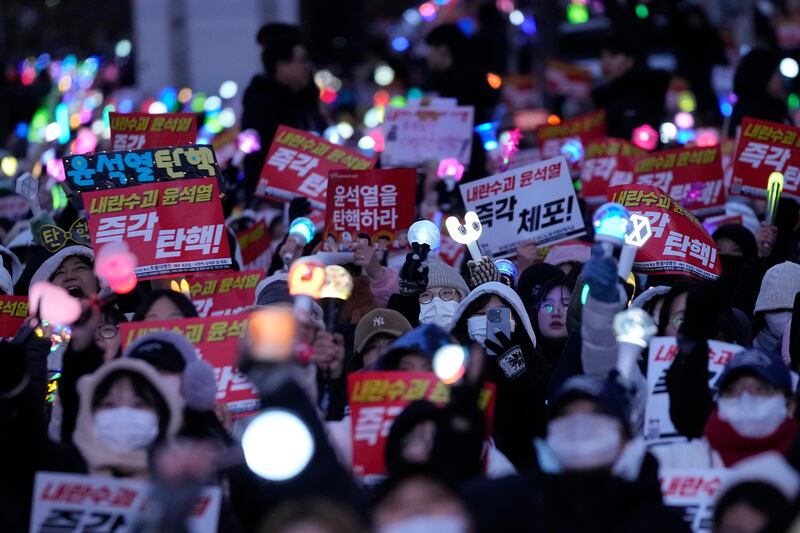 A rally demanding president Yoon Suk Yeol’s impeachment outside the National Assembly in Seoul, South Korea. Photograph: Ahn Young-joon/AP