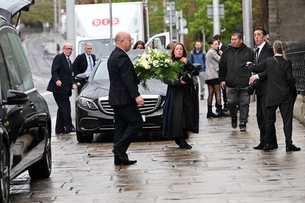 Godfather theme played as remains of Tony Felloni taken from church ...