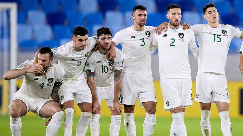 The Ireland players dejected during the penalty shoot-out against Slovakia. Photograph: Tommy Dickson/Inpho