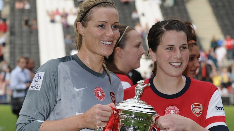 Emma Byrne and Niamh Fahey celebrate Arsenal’s FA Cup win in 2014. Photograph: Tony Marshall/Getty