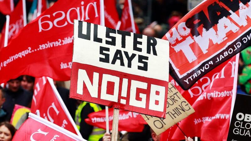 Protesters wave placards and flags during an anti-G8 demonstration in Belfast city centre  this afternoon. Photograph: Cathal McNaughton/Reuters