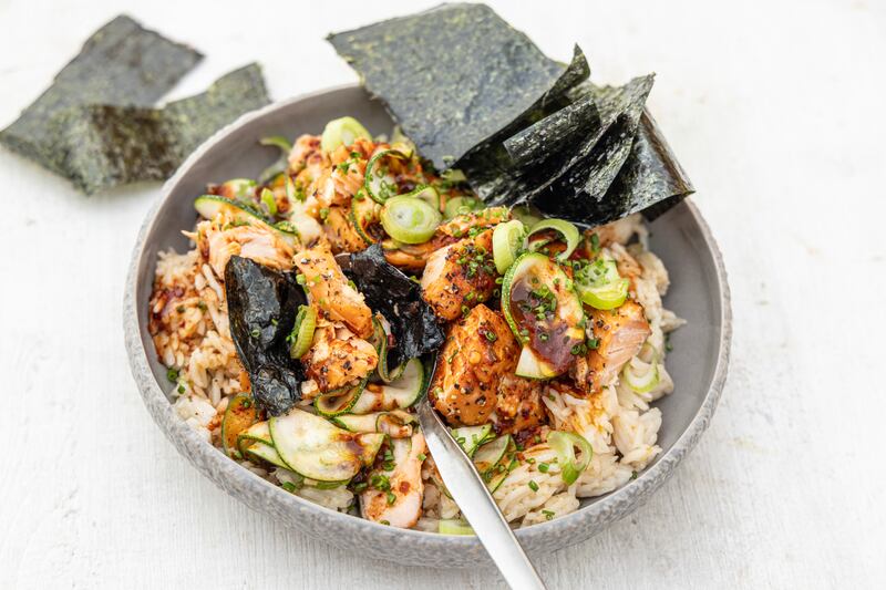 Baked salmon bowl with teriyaki, pickled cucumber and nori