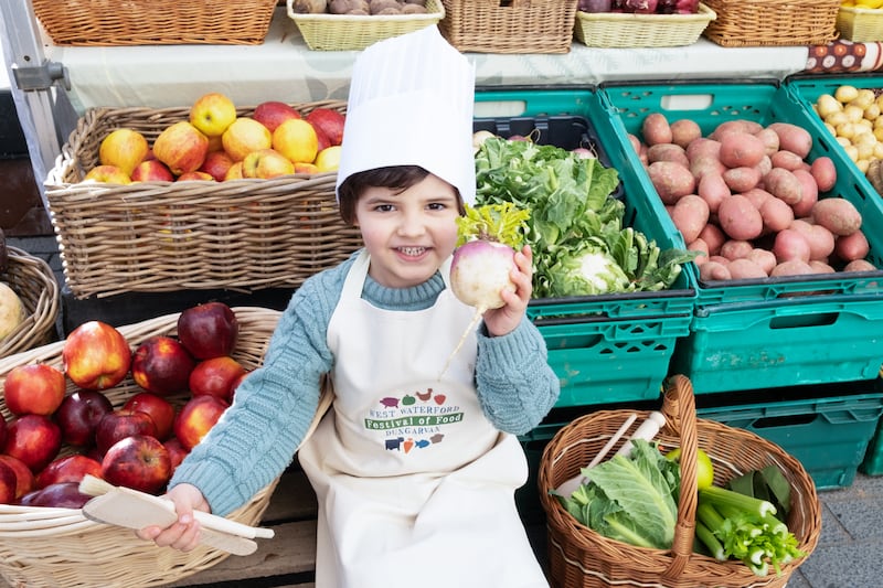 Teddy Drohan (4) from Abbeyside helping to launch Waterford Festival of Food. Photograph: David Clynch