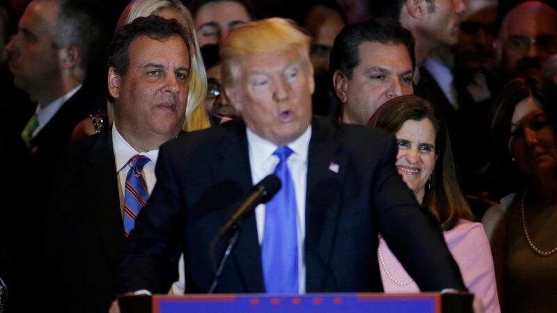 New Jersey Governor Chris Christie (L) and his wife Mary Pat (R) listen as Republican US presidential candidate Donald Trump speaks during Trump’s five state primary night event in New York City on Tuesday. Photograph: Reuters