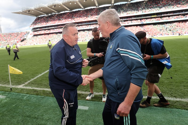 Cork manager Pat Ryan and Limerick's John Kiely following the All-Ireland semi-final when Limerick hopes of a five-in-a-row were dashed. Photograph: Bryan Keane/Inpho 