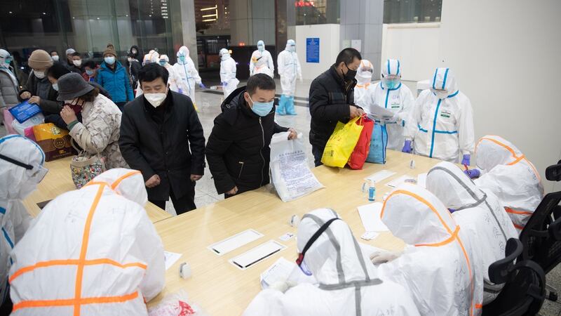 Patients infected by the coronavirus received at a makeshift hospital at Wuhan International Convention and Exhibition Centre. Photograph: EPA