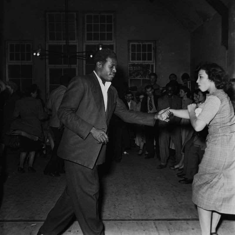 Couples at a dance in the Bute Town or Tiger Bay area of Cardiff in April 1950. Photograph: Bert Hardy/Picture Post/Hulton Archive/Getty Images