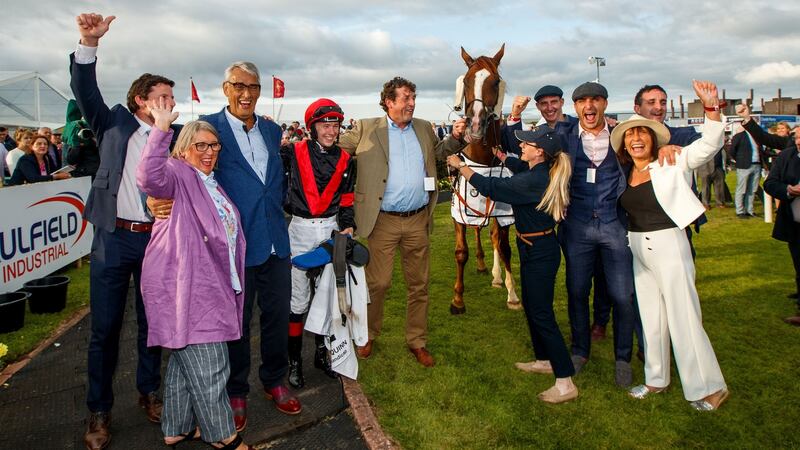 Jockey Colin Keane and trainer Adrian McGuinness with Saltonstall and winning connections. Photograph: James Crombie/Inpho