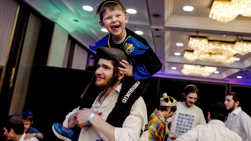 Jews celebrate  Purim Holiday in Berlin with refugees from Odessa.  Tens of thousands fleeing the war in Ukraine have arrived in recent weeks. Photograph: Filip Singer