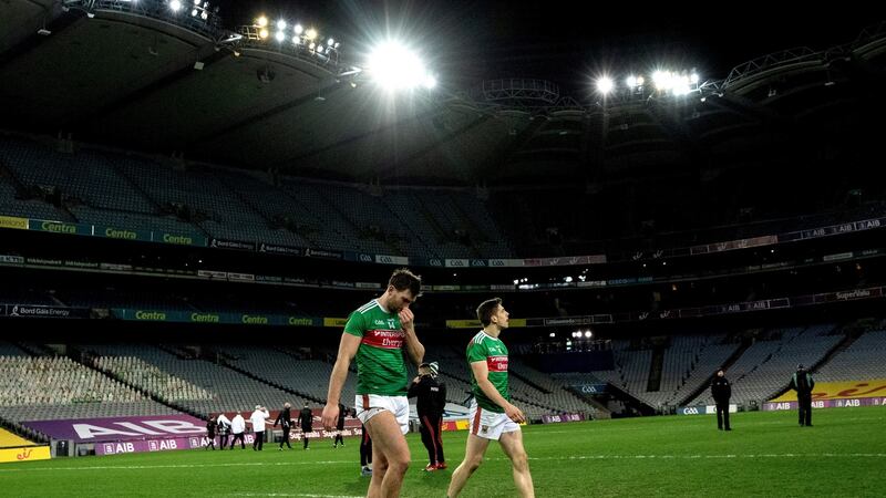 Mayo’s Aidan O’Shea and Lee Keegan leaves the pitch dejected after losing the All-Ireland final to Dublin. Photo: James Crombie/Inpho