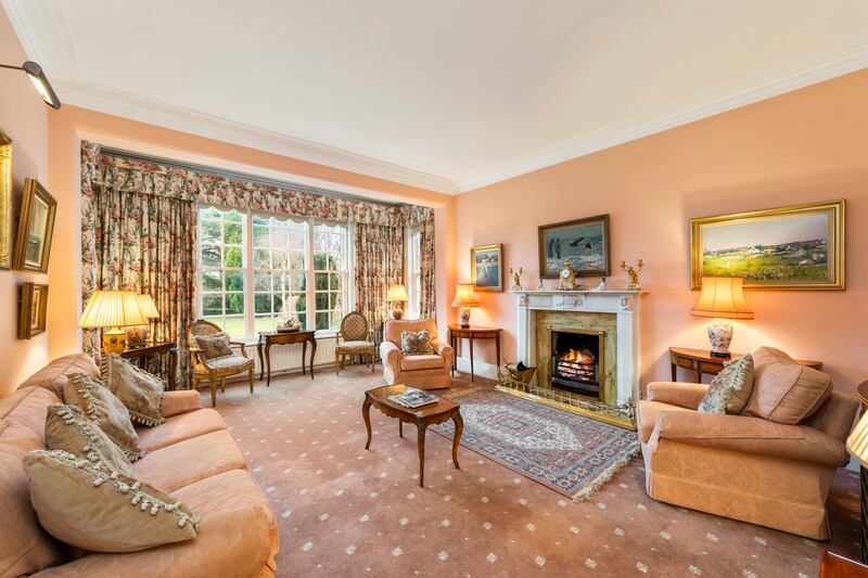 The livingroom and the drawingroom have handsome fireplaces and simple stepped architraves and cornices.