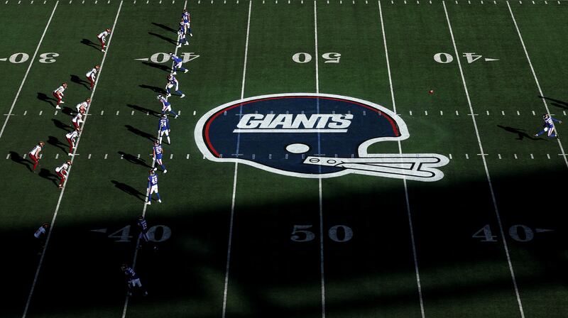 Jude McAtamney kicks off for the New York Giants againt the Washington Commanders at MetLife Stadium. Photograph: Luke Hales/Getty Images