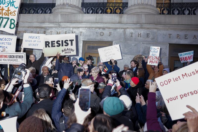 Democratic senator Elizabeth Warren speaks to protesters outside the Treasury department in Washington on Tuesday.  Photograph: Jason Andrew/New York Times
                      