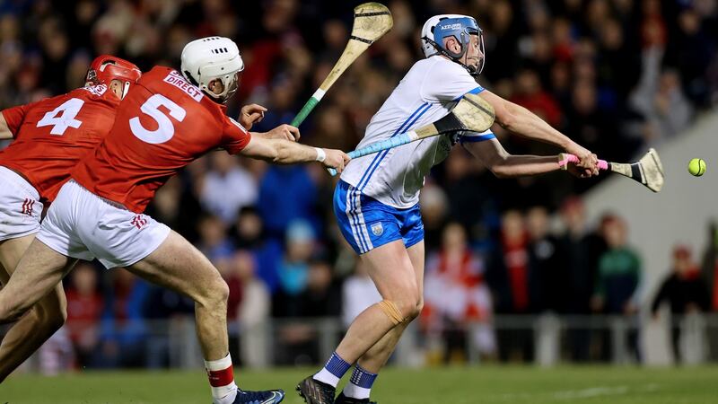 Cork’s Ciarán Joyce and Tim O’Mahony are  unable to prevent Stephen Bennett from scoring Waterford’s third goal in the Allianz Hurling League Division One  Final at  FBD Semple Stadium. Photograph: James Crombie/Inpho