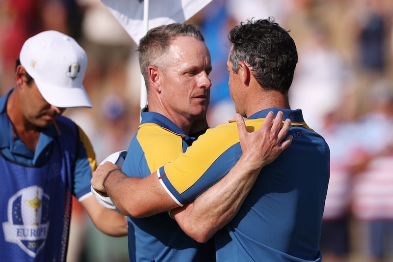 European captain Luke Donald hugs Rory McIlroy after his victory over Sam Burns in the singles matches at the Ryder Cup. Photograph: Richard Heathcote/Getty Images