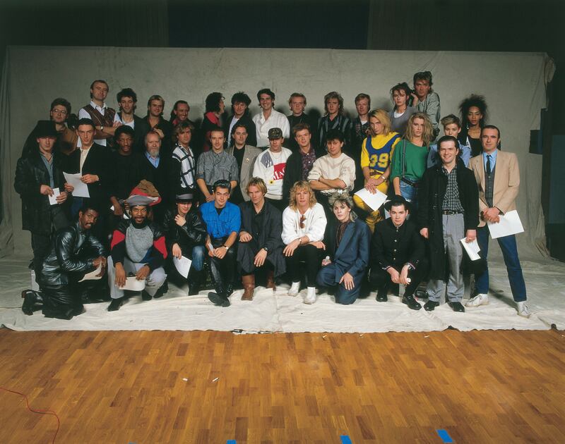 The Making of Do They Know it's Christmas? Adam Clayton, Phil Collins, Bob Geldof, Steve Norman, Chris Cross, John Taylor, Paul Young, Tony Hadley, Glenn Gregory, Simon Le Bon, Marilyn, Keren, Martin Kemp, Jody Watley, Paul Weller, Bono, James Taylor, Peter Blake (Sleeve artist), George Michael, Midge Ure, Martyn Ware, John Keeble, Gary Kemp, Roger Taylor, Sarah, Siobhan, Pete Briquette, Francis Rossi, Robert 'Kool' Bell, Dennis Thomas, Andy Taylor, Jon Moss, Rick Parfitt, Nick Rhodes, Sting, Johnny Fingers. Photograph: Brian Aris/Band Aid Trust,Brian Aris