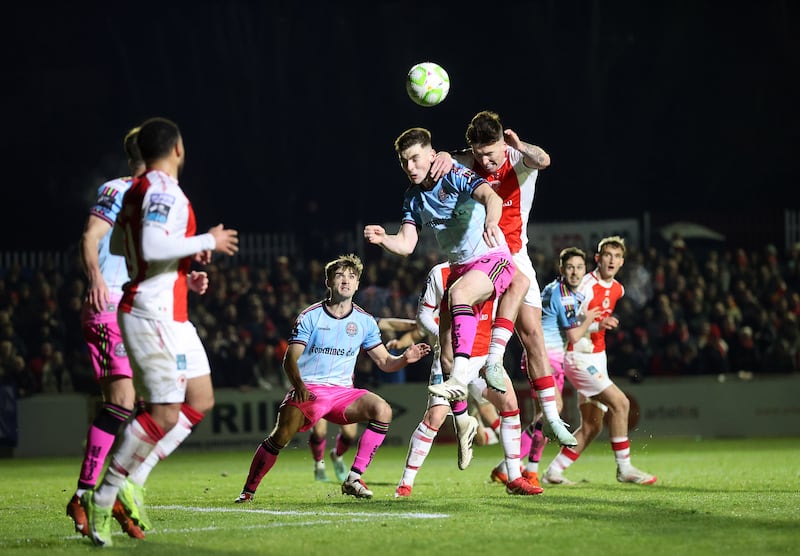 Bohemians's Sean Graham and St Pat's Joe Redmond. Photograph: Bryan Keane/Inpho