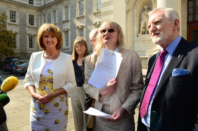 Dr Lydia Foy (centre) with then tánaiste Joan Burton and solicitor Micheal Farrell at the launch of the Gender Recognition Certificate at Government Buildings in 2015. Photograph: Cyril Byrne