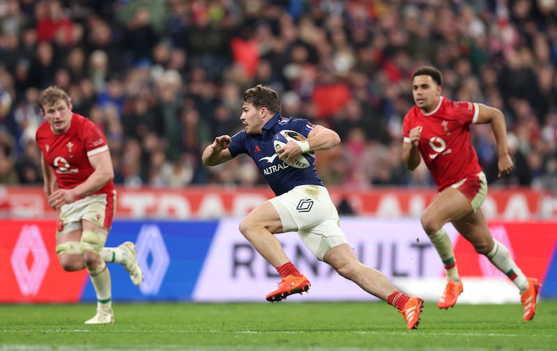 Antoine Dupont cuts through the Wales defence. He produced another outstanding display as he orchestrated France's 43-0 victory at the Stade de France. Photograph: Julian Finney/Getty Images