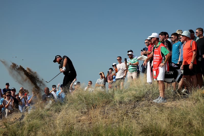 Shane Lowry plays his third shot on the 11th hole during the final round. Photograph: Richard Heathcote/Getty Images