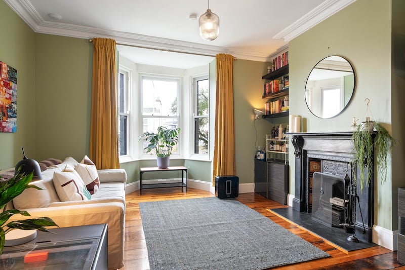 The front livingroom has a fine bay window