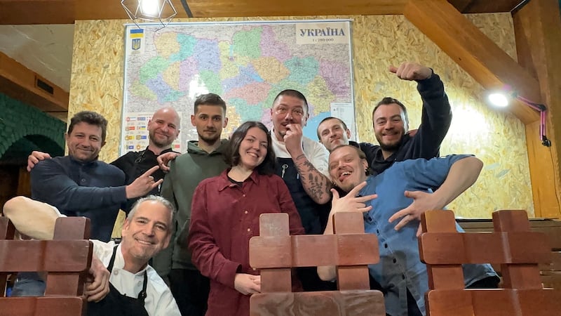 Ukrainian chef Zhenya Mykhailenko, his wife Mary and other members of his cooking team, which has made about a million packed meals for a Ukrainian special forces battalion in less than three years from their kitchen in Zaporizhzhia region. Photograph courtesy of Mary Mykhailenko