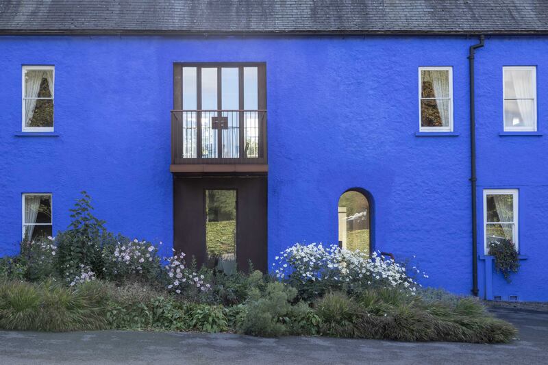 Marjorelle blue covers the gables and rear. Photograph: Ste Murray
