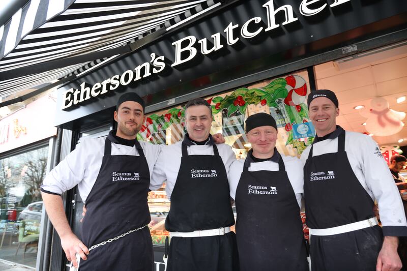 At Etherson’s butchers shop in Cabra, Dublin: owner Seamus Etherson (second from left), with his son James (left) and colleagues Paul Lambe and Kevin McGucken. Photograph: Bryan O’Brien/The Irish Times


