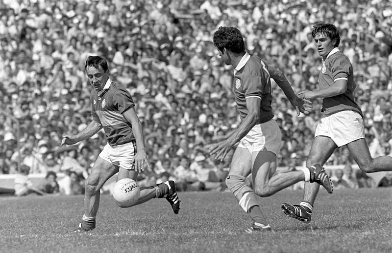 Kerry's Denis 'Ogie' Moran is challenged by Kevin Kehily and Tony Nation (right) of Cork during the 1984 Munster SFC final at Fitzgerald Stadium in Killarney. Photograph: Ray McManus/Sportsfile