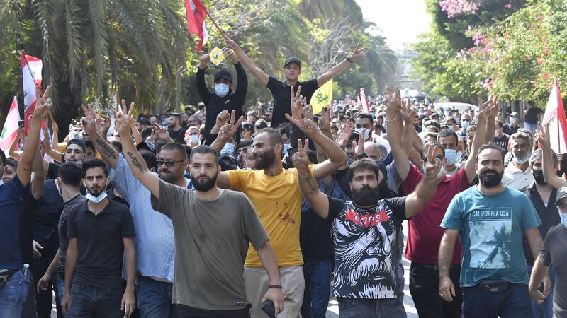 Hundreds of Hizbullah and Amal Movement supporters during a rally in Beirut on Thursday. Six people were killed after snipers opened fire on the protesters. Photograph: Hussam Shbaro/Anadolu Agency via Getty Images