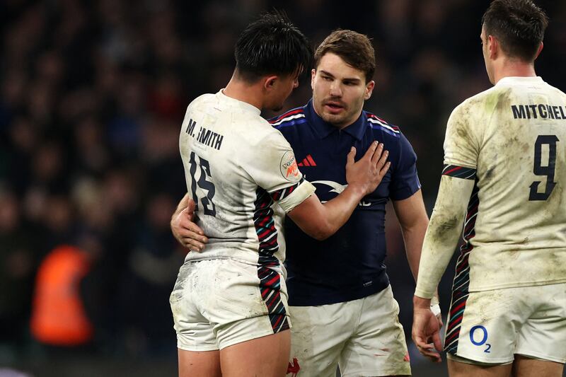 England's Marcus Smith consoles France's Antoine Dupont at the final whistle of the Six nations game at Twickenham on Saturday. Photograph: Adrian Dennis/AFP via Getty Images