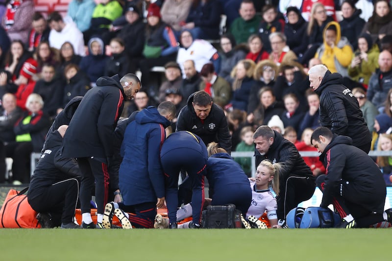 England's Leah Williamson receives medical treatment after injuring an ACL in a Women's Super League match between Arsenal and Manchester United last year. Photograph: Naomi Baker/Getty Images