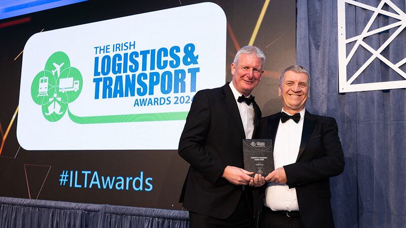 Lee Hazzard, assistant recruitment manager / office manager, ISM Recruitment presents the award logistics & transport leader 2024 to Philip Tracey, Ace Express Freight