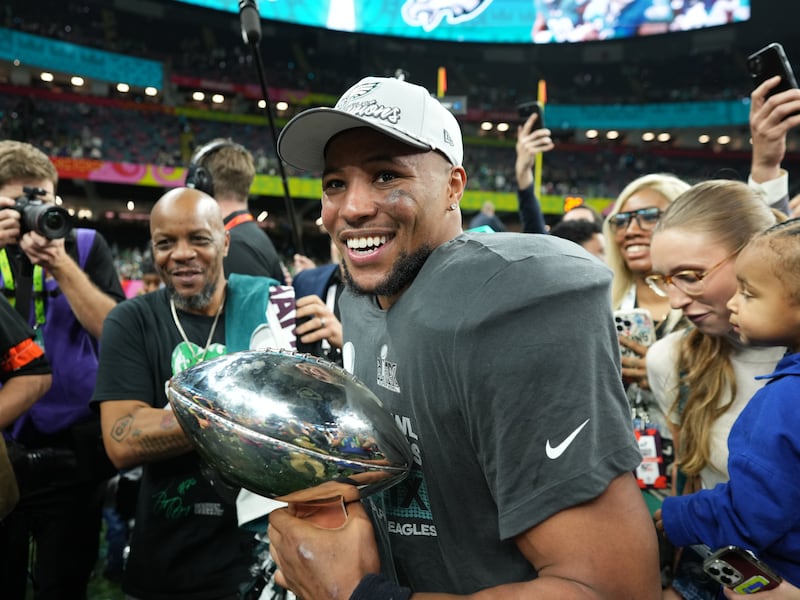 Philadelphia Eagles running back Saquon Barkley holds the Vince Lombardi Trophy. Photograph: Doug Mills/The New York Times