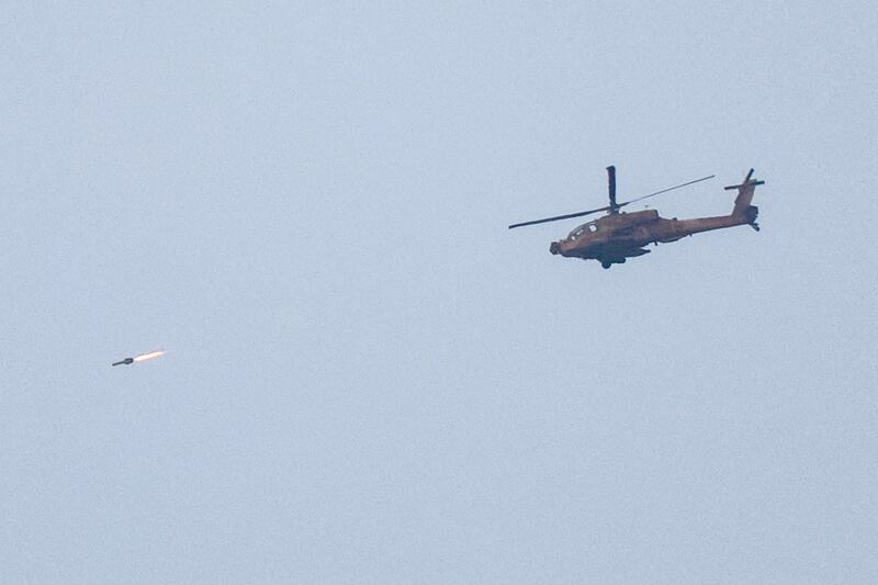 An Israeli air force attack helicopter fires a missile while flying over the northern Gaza Strip near the border with southern Israel on December 17th. Photograph: Jack GUEZ/AFP via Getty